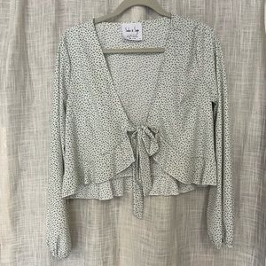 White and blue wrap top.